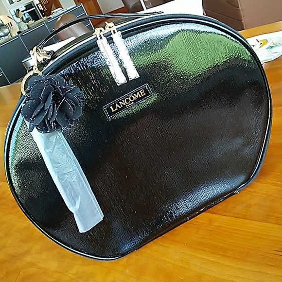 Lancome Handbags - LANCOME TRAIN COSMETIC CASE!